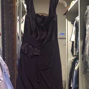 Silk cocktail dress with detail in front.